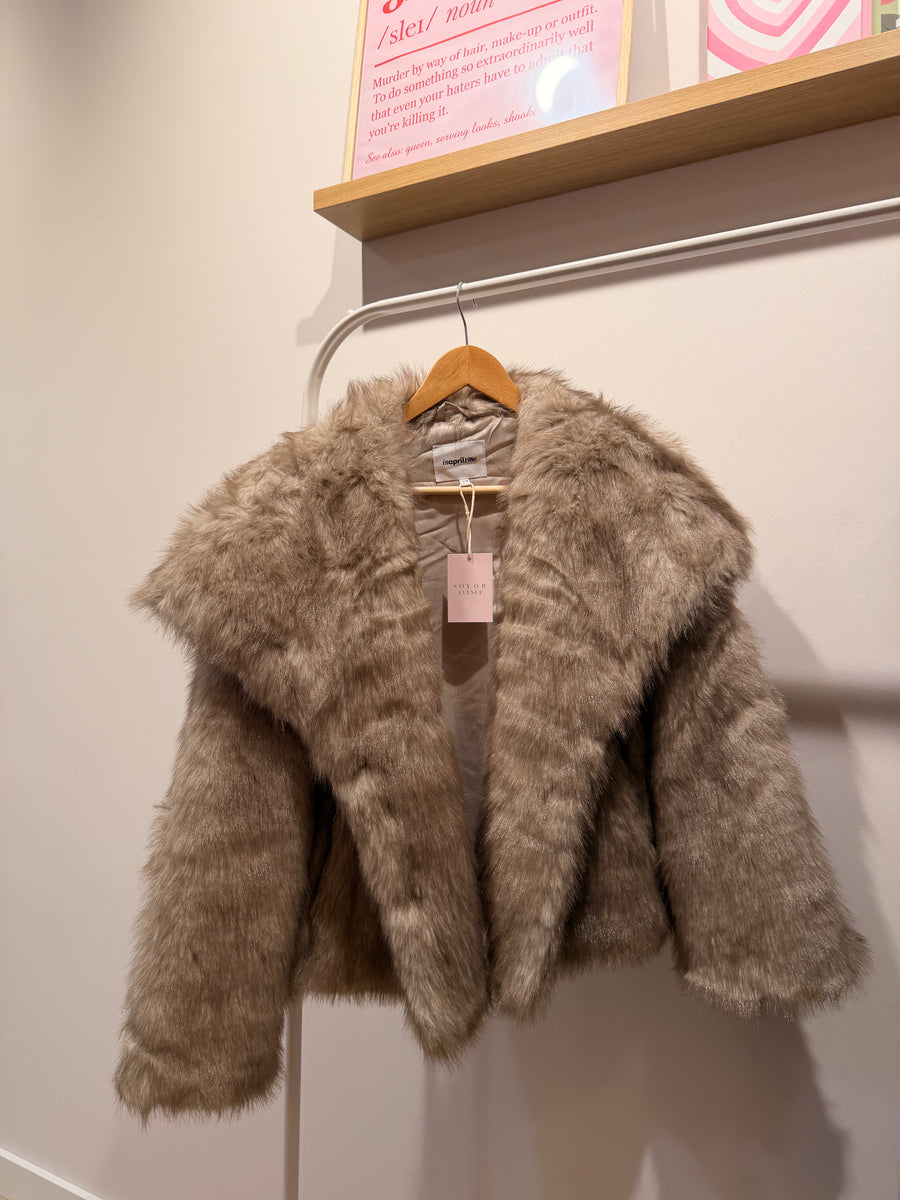 Manteau fausse fourrure