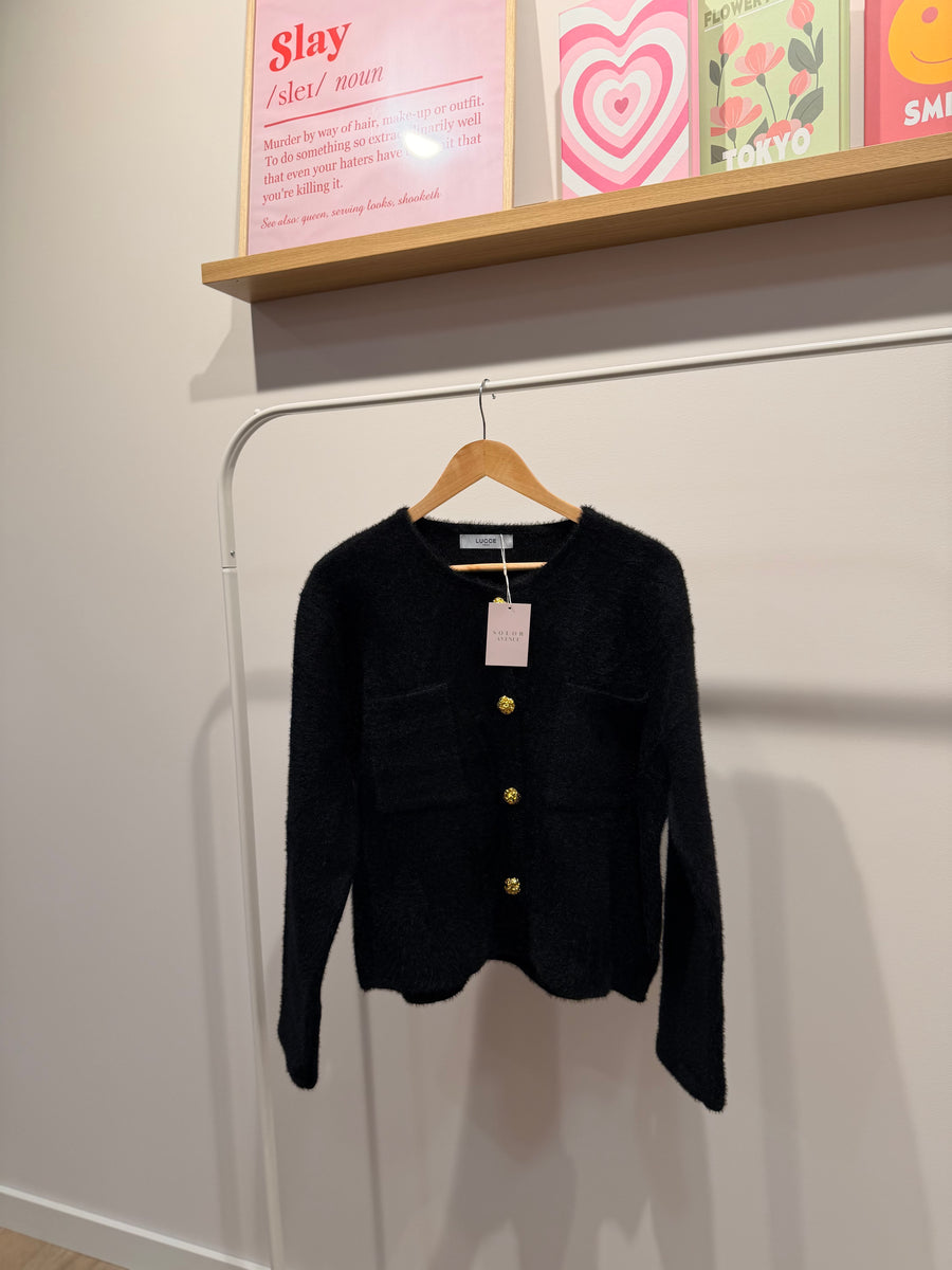 Veste avec boutons dorés