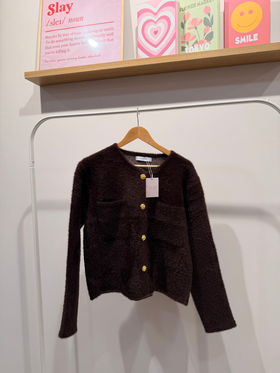 Veste avec boutons dorés