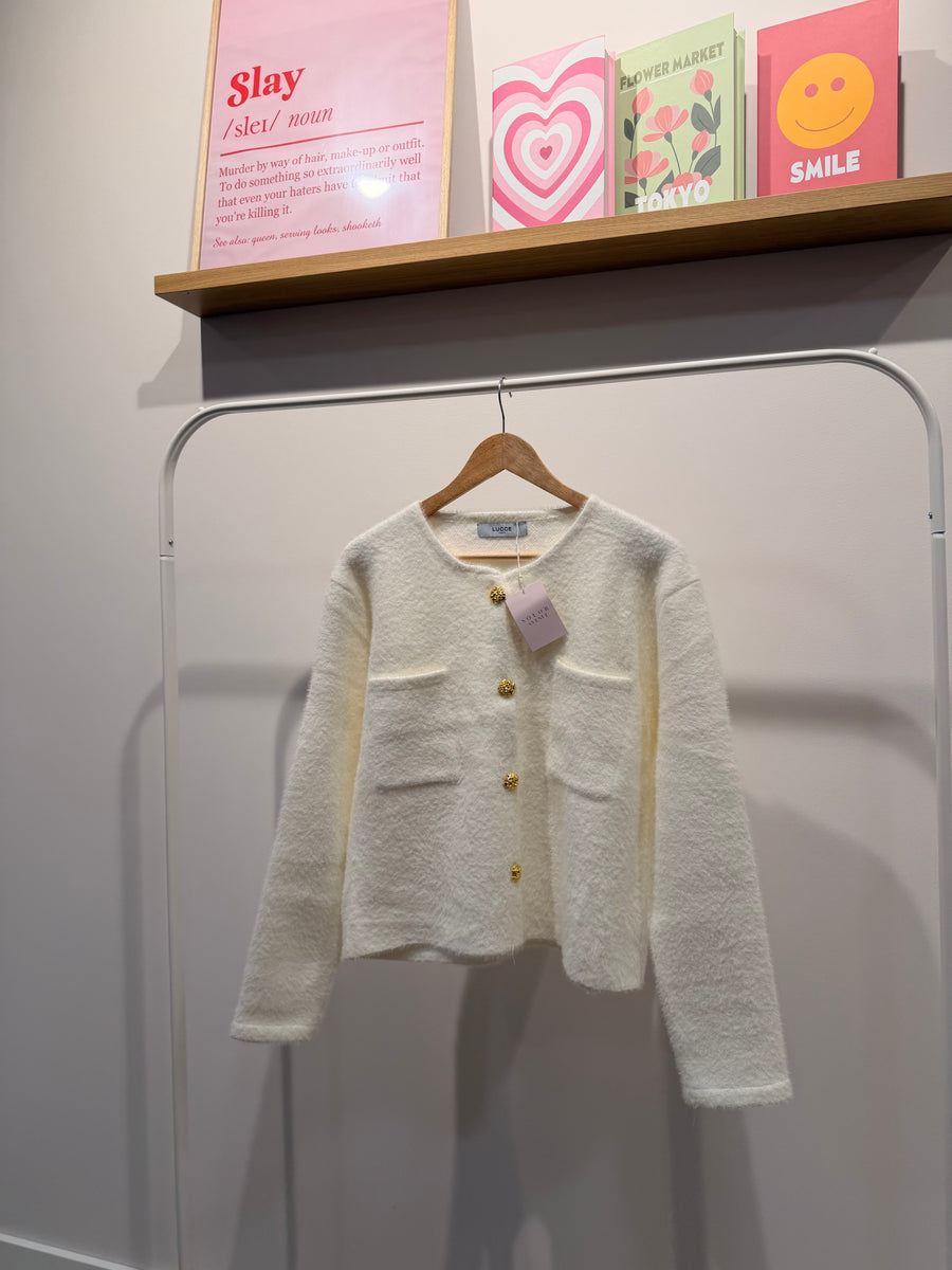 Veste avec boutons dorés